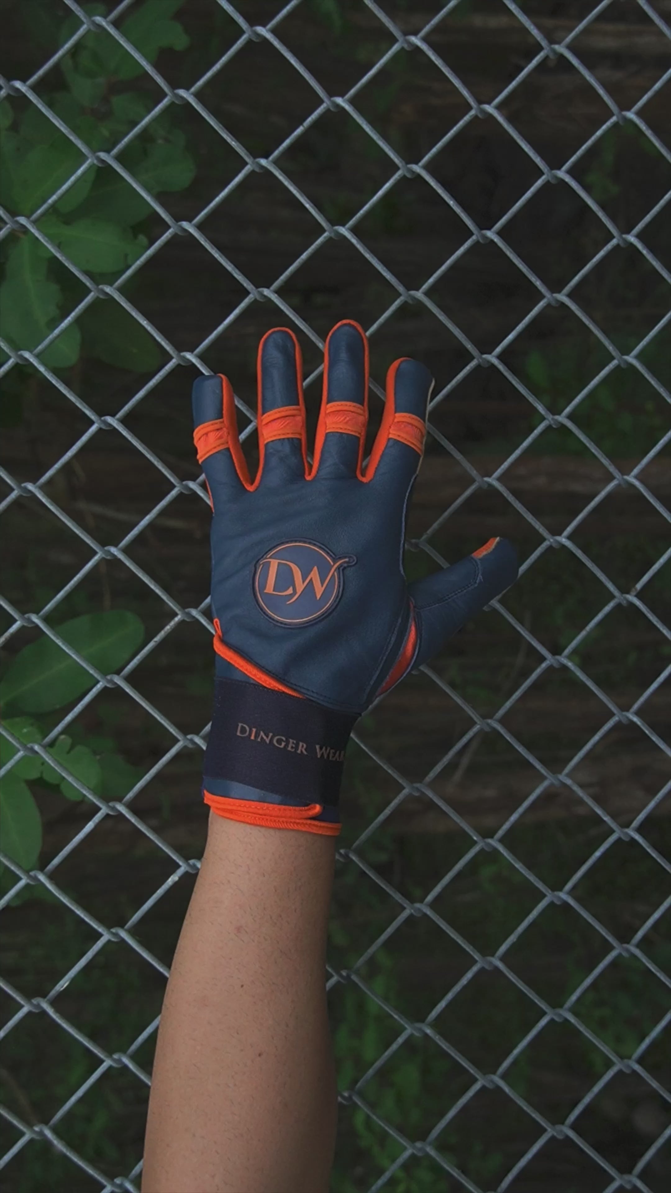 Navy and orange batting gloves on sale